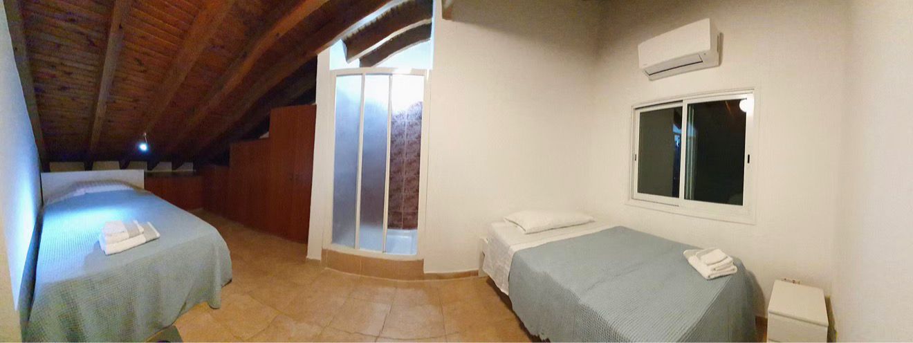 Loft bedroom with twin beds